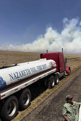 Castro County First Re- sponders and fire depart - ments from Dimmitt, Naz areth and Hart have been busy since last week fight - ing a number of wild fires in the Texas Panhandle. This week, local departments pitched in to help control a fire near Kress. Fires in the Amarillo and Canyon area continue to be monitored. (Courtesy photos)