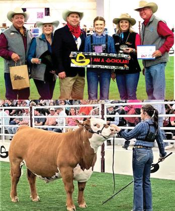 Nazareth FFA Harper Johnson won Breed Champion Red Cross at the San Antonio Livestock Show, made the sale and won a $10,000 scholarship