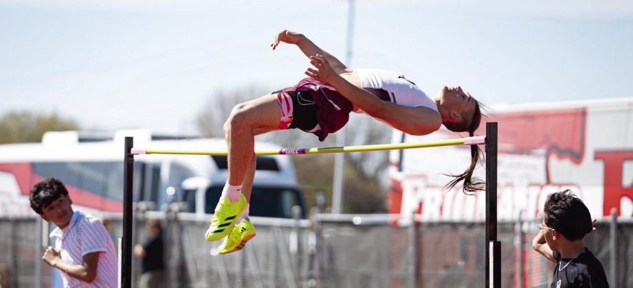 Two Hereford Whitefaces have advanced to the UIL State Track and Field Championships Thursday, May 14 in Austin. Izak Dominguez (left) won the 110-meter hurdles event with a time of 13.87 seconds at the Regional Track Meet in Lubbock setting a Region I-4A record. Brix Machen (below) cleared a height of 6-feet, 8-inches to win second place at the Region Meet and qualify for state.