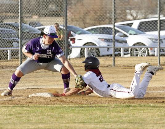 Jacob Trevino slides in safe at 3rd