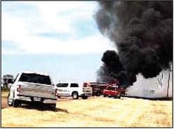 First responders battle tractor fi re