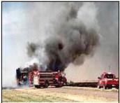 First responders battle tractor fi re