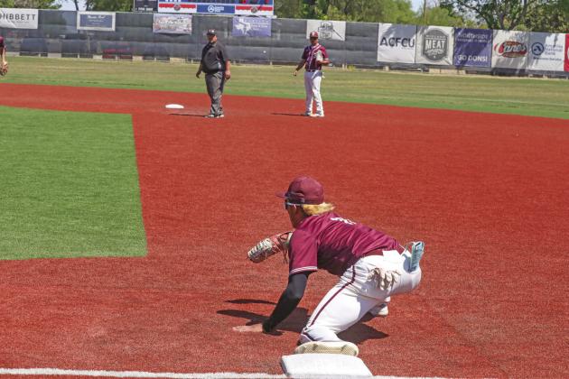Gustavo Trevino stretches to make the catch and out