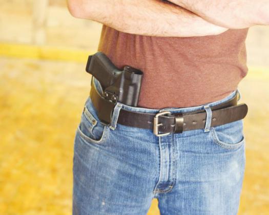 Abbott signs permitless gun carry bill