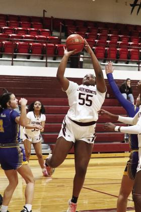 Faith Adams goes up for the shot