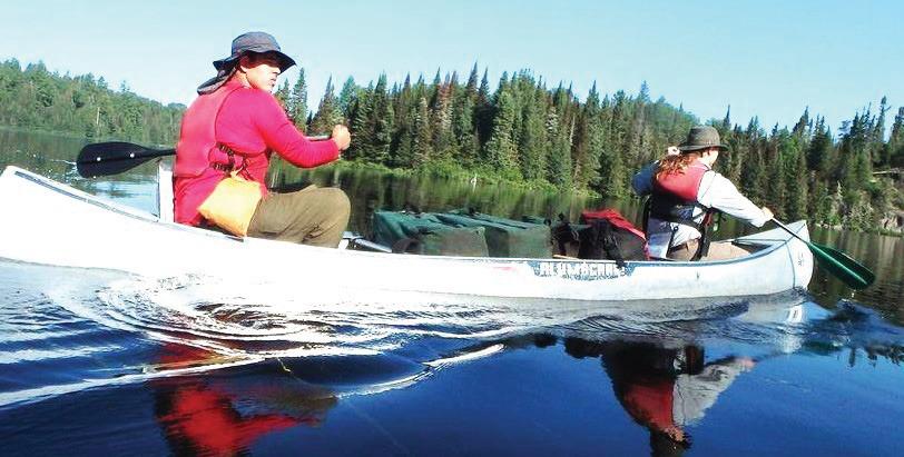 Nazareth scout Jesse Acker and the guide paddle their way through Canadian waters during the wilderness trip.