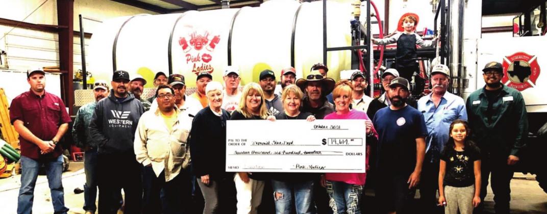The Dimmitt Pink Ladies presented a check for $14,614 to the Dimmitt VFD following another successful chili cookooff benefit and DVFD golf tourney.