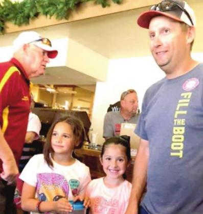 (right) Dani Escamilla and Makynlie Chavira sold lemonade at the event and donate $134 to the DVFD.