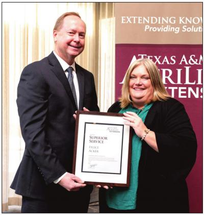 Rick Avery, Ph.D., Interim Director of Texas A&amp;amp;M AgriLife Extension Service, presented the Superior Service Award to Felice Acker, CEA, Castro County AgriLife Extension agent.