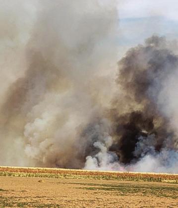 Local fire departments battled a fire in a corn field on CR 516 last Friday. Residents are urged to use caution even though there currently is no fire ban given the dry, windy conditions in the county.