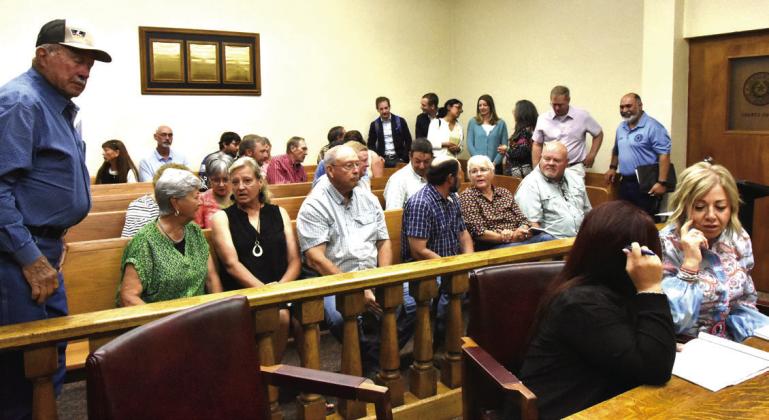 CROWD ON HAND--A large crowd of county and city residents was on hand in the County Courtroom of the Deaf Smith County Courthouse at the June 23 county commission meeting to hear and observe county commissioners give technology giant Google LLC and its affiliates along with IP Roman Gas property tax abatements on potentially billions of dollars worth of projects in Deaf Smith County over the next decade in return for substantial payment in lieu of taxes. (Photo by Jim Steiert)