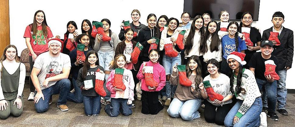This past Sunday, the Texas Tech pediatric doctors met with Hart High School students to discuss the value of staying in school and not giving up hope. Students got to stuff a stocking to take home, and create gift baskets for some elderly residents of Hart and delivered them.