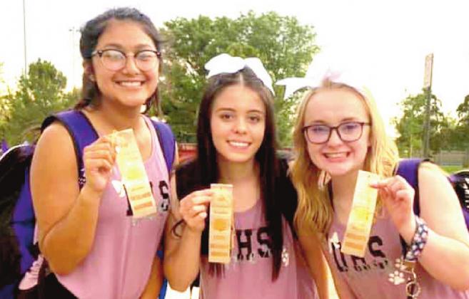 DHS cheerleaders Nina Vasquez, Karla Perez and Klancy Bruton