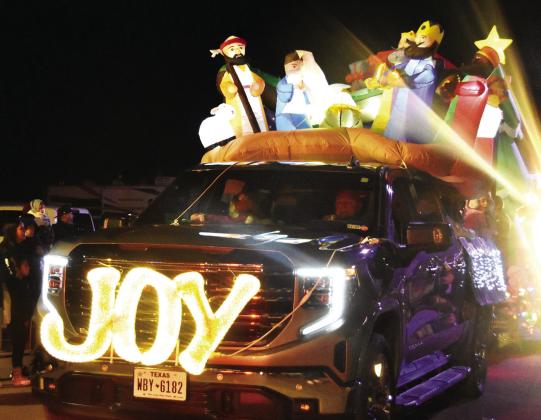 JOY! –A message for the Christmas season in the Lighted Parade. (Photo by Jim Steiert)