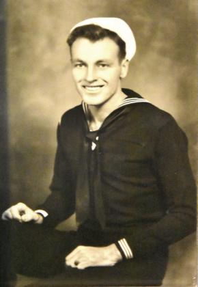 NAVY DAYS--Bub Sparks in Navy uniform dating to 1944 when he enlisted in the U.S. Navy at age 18. His time at sea included stops at 'exotic places' like Iwo Jima and Okinawa in desperate closing battles of World War II. Despite sailing the vast Pacific, he says he never learned to swim. Sparks is the oldest living veteran of World War II locally.