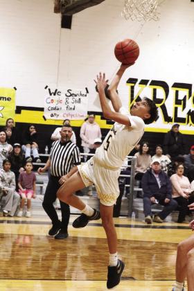 Kobie Vuittonet goes in for a layup