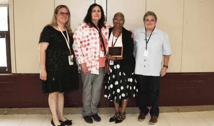 Mrs. Fifer was recognized for her retirement after 38 years of educational service. Pictured with Mrs. Fifer are Brooke Whitworth, Dixie Johnson, and Lynett Walker