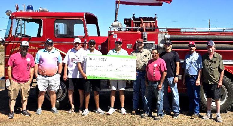 Dimmitt Volunteer Fire Department received a $1,000 check from Invenergy/ Bethel Wind Farm.