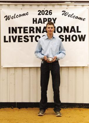 Champion Swine Showmanship-Kannon Flowers Photo by Avary Wesley