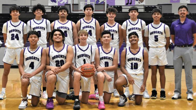 DHS Bobcats Varsity Basketball-# 0 Cesar Navarro, #1 Joshua Seaton, #2 Justin Saenz, #3Enrique Holguin, #4 Jadrian Herrera, #5 Frankie Cortez, #10 Isaiah Ramirez, #11 Kaden Carpio, #14 Eric Duenas, #20 Gaquorie Chatham, #24 Keenan Hernandez, #34 Alex Hernandez and Coach Martin Rodriguez.