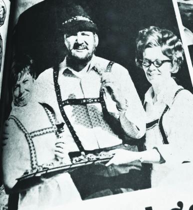 HELPED GET IT GOINGThe late Don Nelson, center, former editor/publisher of the Castro County News, is shown clad in Tyrolean Hat and folk clothing at center in this photo from the ini - tial Nazareth German Folk Festival in 1973 in company with lovely Nazareth ladies. Nelson pushed the original concept of the German Fest in Nazareth.