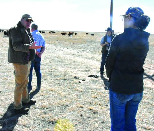 PLANNING WATER FUTURE--Dr. Chris Grotegut speaks to a field trip group on February 24 concerning grazing land management that can enhance recharge to the Ogallala aquifer. Dr. Grotegut spoke February 25 and detailed work toward a water plan for Hereford. (Photo by Jim Steiert)