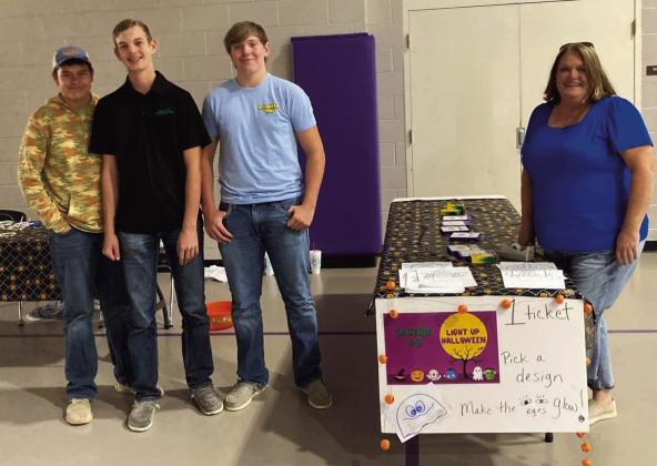 This past Saturday night at DHS, Castro 4-H had a booth at the Dimmitt Fall Carnival. Texas 4-H STEM Ambassador Spencer Acker planned the booth where youth colored Halloween faces and then used copper tape, to create a circuit that makes eyes light up. 4-Hers Harrison Meador, Caysen High, Oliver Meador and Remington Meador manned the booth and helped youth all night with their creations.