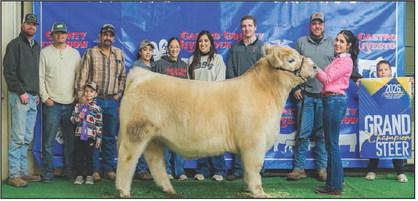 Kaylin Acker and the Grand Champion Steer at the Nazareth Stock Show.