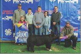 Quincy Hartman and the Reserve Grand Champion Barrow at the Nazareth Stock Show.