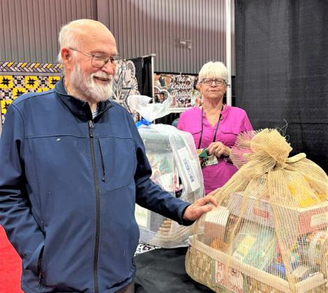 Ogallala Quilt Festival Hotel California Basket winner Wendell Tucker.