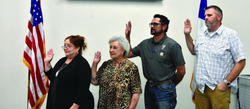 SWEARING IN CEREMONY--Newly elected and re-elected city commissioners were sworn in during a special city commission meeting on May 11 at City Hall. Taking the oath of office from left are incumbent City Commissioner Place 2 Angie Alonzo, newly elected At-Large Commissioner Place 6 Margaret Del Toro, newly elected City Commissioner Place 4 Jeremy Lopez, and incumbent At-Large Commissioner Place 5 James Stow. They were sworn in by City Secretary Franchesca Jimenez.