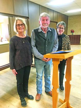 Tangy Garrison and Sherry Malone welcome Harold Drake to Progressive Study Club as he presented the program