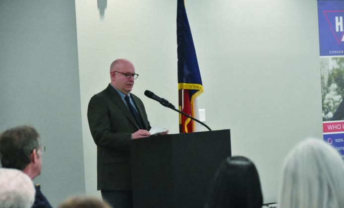 CHRIS STROWD--Former District Attorney and candidate for 222nd District Judge, addresses the crowd. (Photo by Jim Steiert)