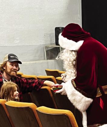 Santa and the Grinch visit Tulia Fire Department