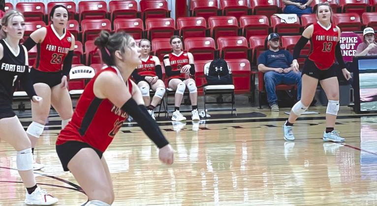 Varsity Lady Cougar, McCauley Jernigan, passes the ball in their win over Wildorado.