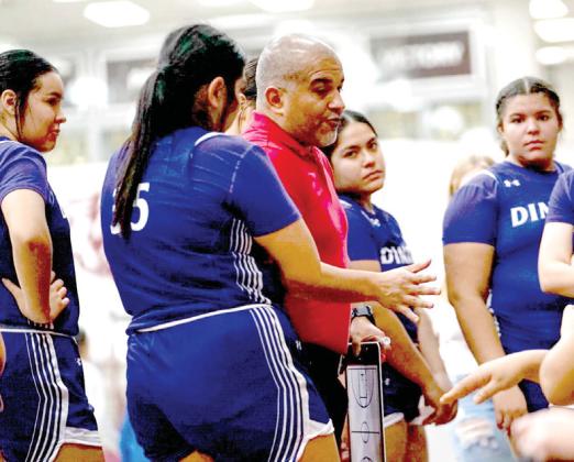 Bobbies Coach Jason Ayala giving instructions during a time out against the Littlefield Lady Cats.