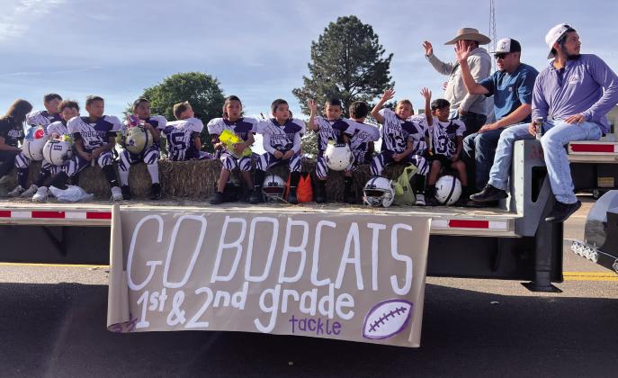 The first and second grade Bobcats enjoy the Harvest Days Parade last weekend.