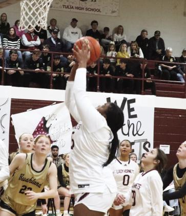 Tulia’s Faith Adams goes up for two
