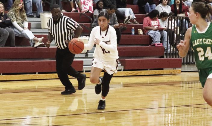 Kimberley Joven heads to the basket