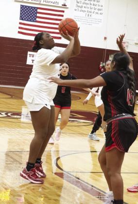 Faith Adams takes aim at the basket