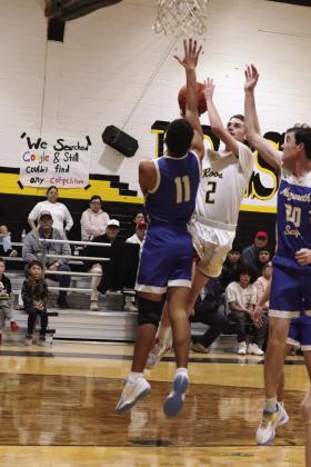 The Nazareth Swifts remain in first place in district after beating Kress 53-35. Blaise Snead (11) and Zac Huseman defend the paint. Zane Schulte led Nazareth scorers with 16 points, Jett McLarty added 15, while Snead and Huseman each scored seven. Trapper Neill had four points, Ethan Brockman two points and Tripp Ethridge two. (CCN photo)