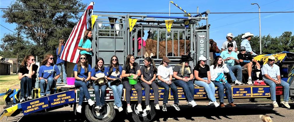 The Nazareth Ag and FFA students participated in the annual Labor Day Parade this past weekend, complete with a live bovine in the working chute on the float.