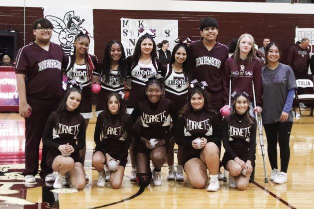 Tulia High School Cheerleaders were recognized at half time of the boys’ basketball game against Childress