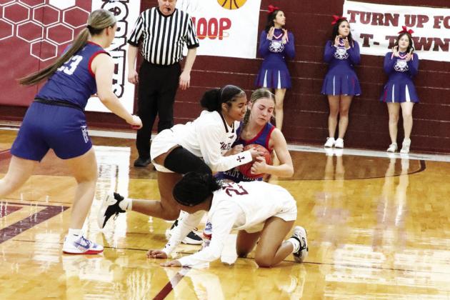 Day’Lynn Brookins fights for the ball