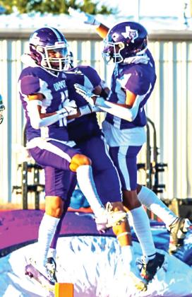 DHS Bobcats celebrate a touchdown during the Homecoming game against Highland Park. (photo courtesy of Dimmitt Sports Media/DISD)