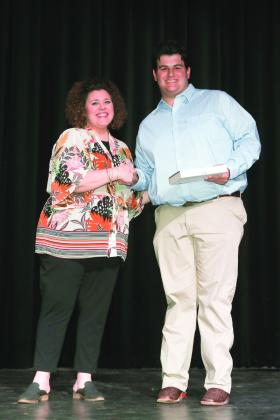 Mrs. Robin Salazar presented the Plainview Herald’s Tomorrow’s Leader Award to Luke Moore.