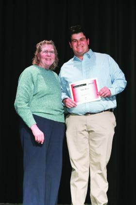 Mrs. Rebecca Cobb presented the English Award to Luke Moore.