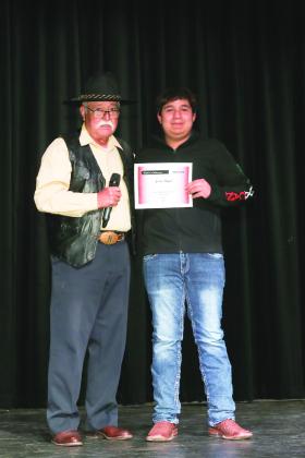 Mr. Francisco Morales gave the Spanish Award to Adrian Reyes.