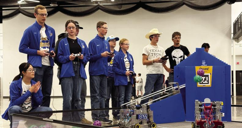 (From left) Anna Chea, Spencer Acker, Olivia Raef, Michael Fulkerson, Drew Bennett, Charlie Demoss, Adalyn O'Connor. Left, Nazareth Robotics Team 16617 with their Sunray alliance partner.