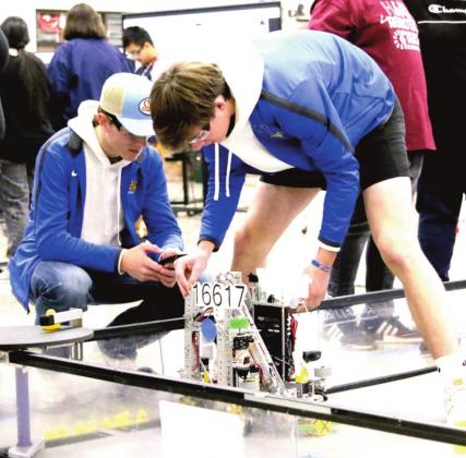 Naz Robo team 16617 members Tanner Birkenfeld and Luke Schulte prepare to compete in a match at the league meet. (photo by Chloe Birkenfeld)